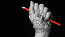 3. Mai ist internationaler Tag der Pressefreiheit. Foto: Gefesselte Hand mit Stift | Adobe Stock | Siam