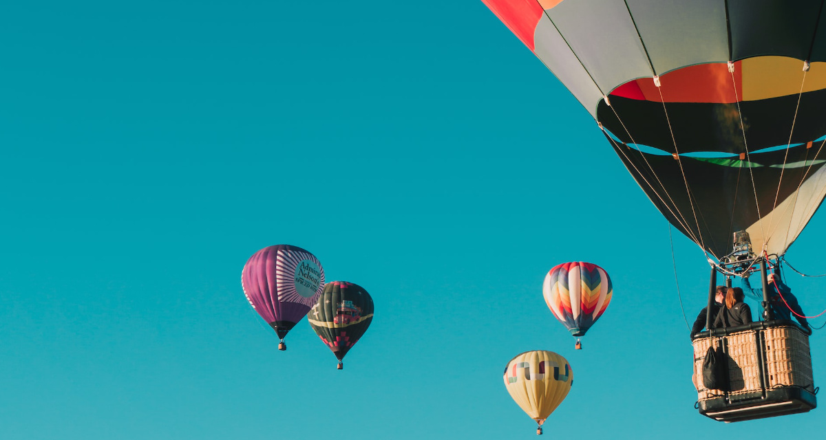 Symbolbild Heißluftballone. Foto: unsplash | Ian Dooley