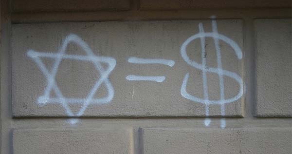 Stern und Dollarzeichen mit Graffiti auf Hauswand gesprüht